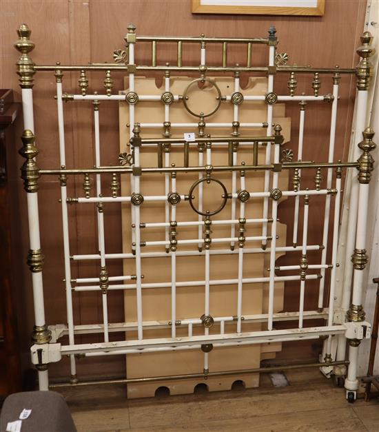 A late Victorian painted metal and brass mounted bedstead, with side irons, W.138cm H.160cm